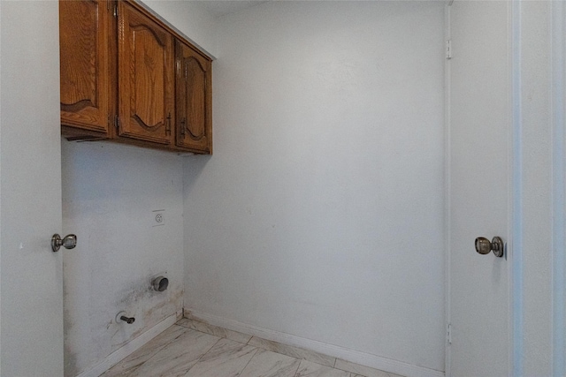 washroom featuring cabinets and hookup for an electric dryer