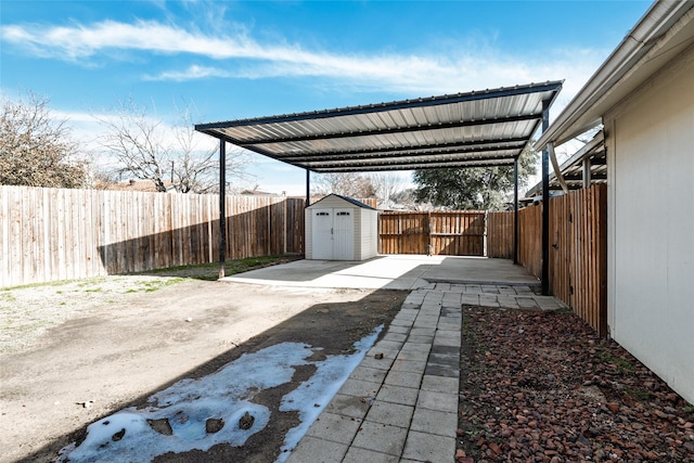 view of patio / terrace featuring a storage shed