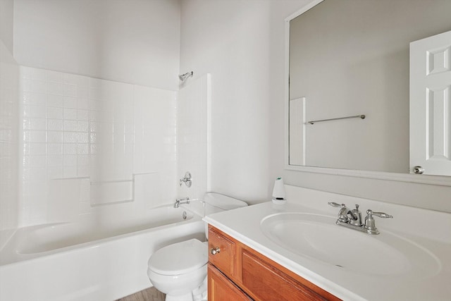 full bathroom featuring toilet, shower / washtub combination, and vanity