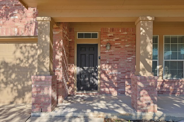 doorway to property with a porch