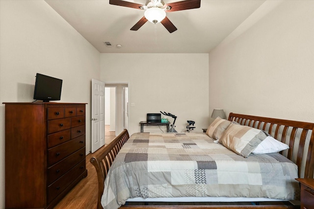 bedroom featuring ceiling fan and hardwood / wood-style flooring