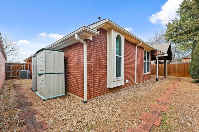 view of home's exterior with central AC unit