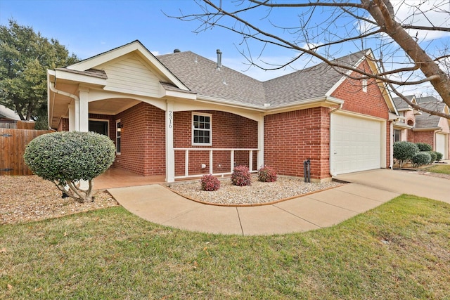 view of front of home featuring a garage, covered porch, and a front lawn