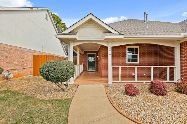 doorway to property featuring a porch