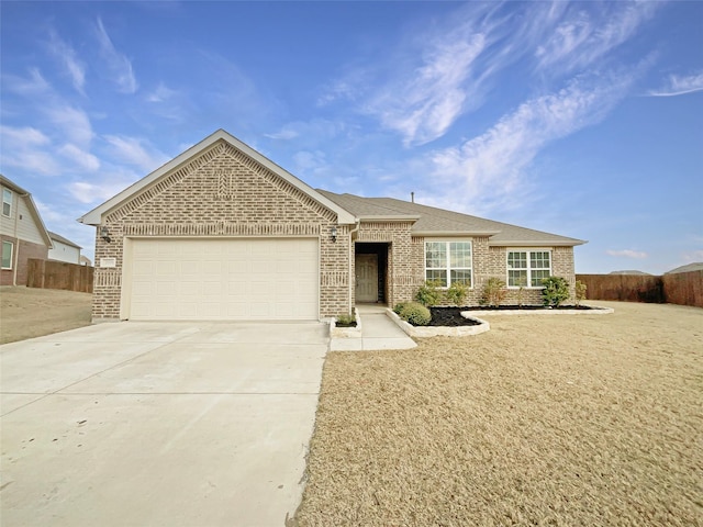 single story home featuring a garage