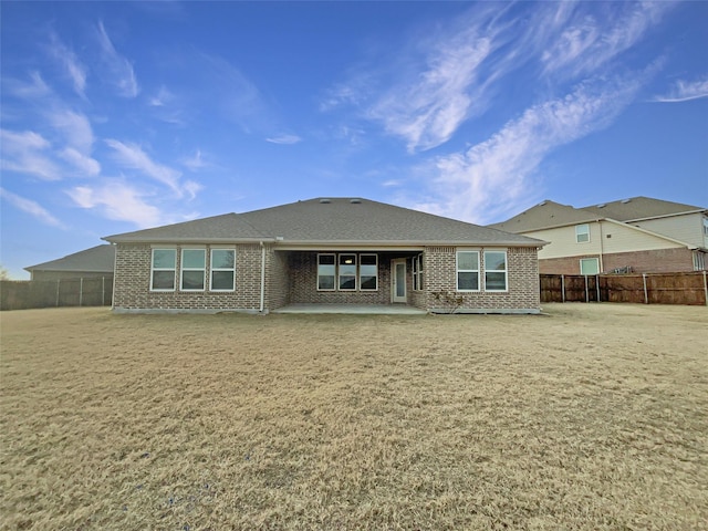 rear view of house with a patio