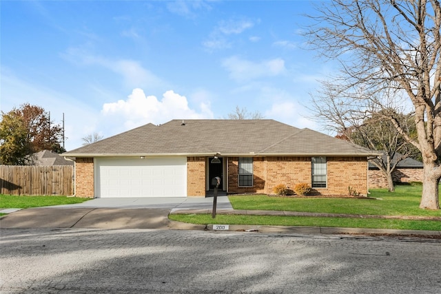 single story home featuring a front yard and a garage