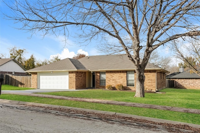 single story home with a garage and a front lawn