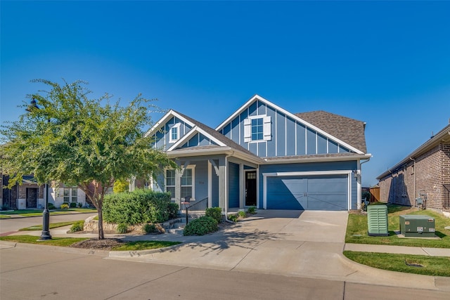 craftsman inspired home featuring a garage and covered porch