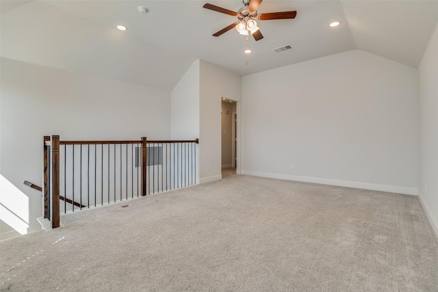 bonus room with ceiling fan, vaulted ceiling, and carpet