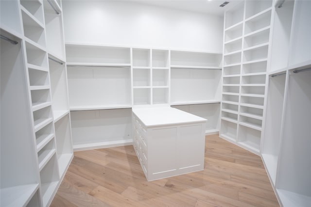 walk in closet featuring light wood-type flooring