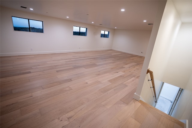 basement featuring light hardwood / wood-style floors