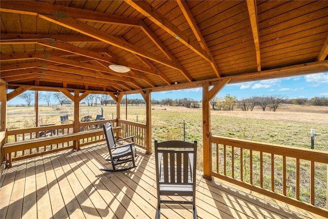 wooden terrace with a rural view