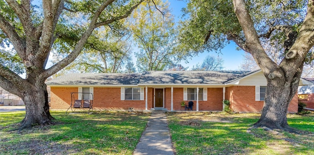 ranch-style house with a front yard