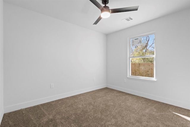 unfurnished room with carpet flooring and ceiling fan