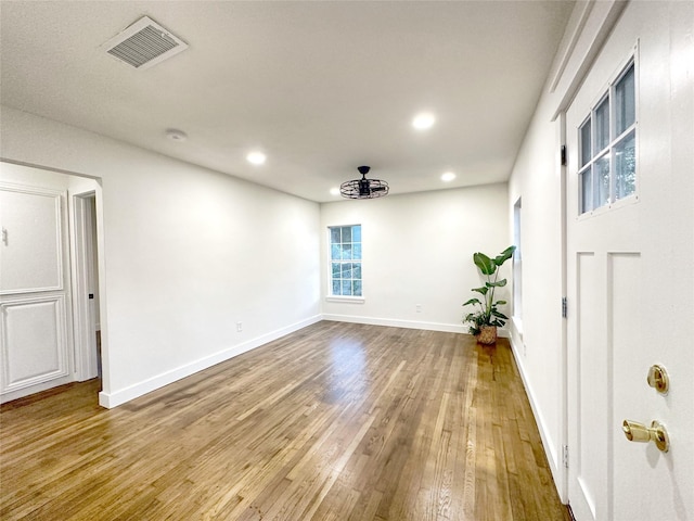 empty room featuring hardwood / wood-style flooring