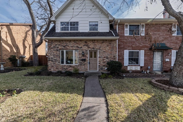 view of front of home with a front lawn