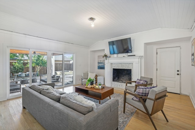 living room with wooden ceiling, vaulted ceiling, and light hardwood / wood-style flooring