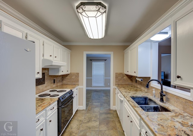 kitchen featuring sink, white cabinets, refrigerator, and electric range