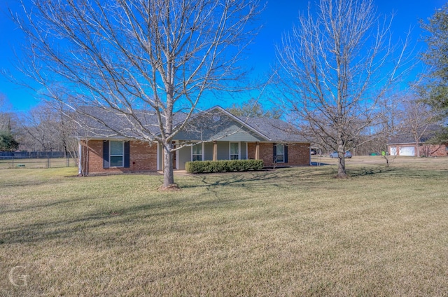 ranch-style house with a front yard