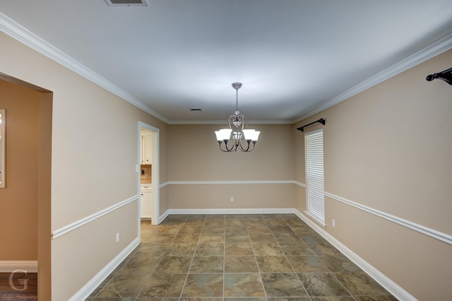 unfurnished dining area featuring an inviting chandelier and crown molding