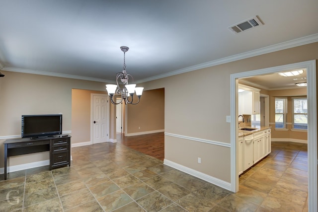 interior space with an inviting chandelier, ornamental molding, and sink