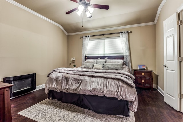 bedroom with dark wood-type flooring, ceiling fan, and crown molding