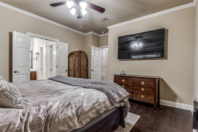 bedroom featuring dark wood-type flooring, ceiling fan, ornamental molding, and connected bathroom