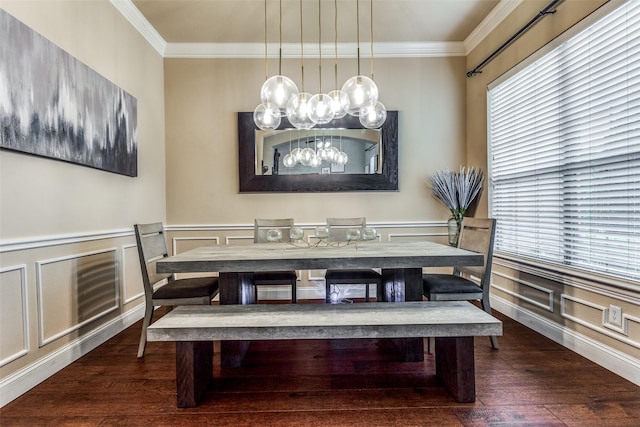 dining room featuring dark wood-type flooring and crown molding