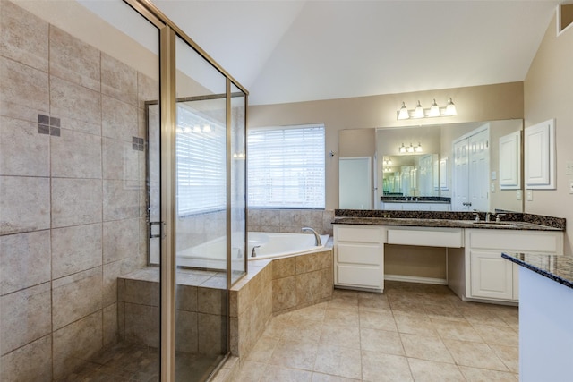 bathroom with lofted ceiling, tile patterned floors, independent shower and bath, and vanity