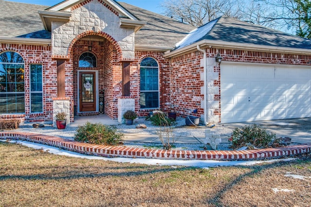 view of front of home with a garage