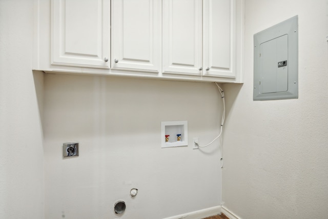 clothes washing area with electric panel, electric dryer hookup, hookup for a washing machine, cabinets, and gas dryer hookup