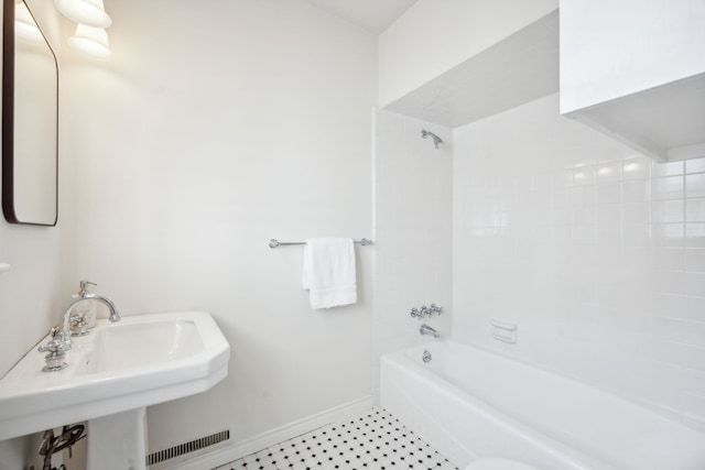 bathroom with sink and shower / tub combination