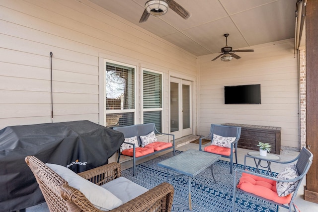 view of patio featuring french doors, ceiling fan, and outdoor lounge area