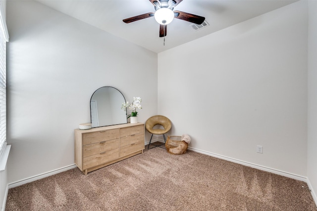 unfurnished room featuring carpet floors and ceiling fan