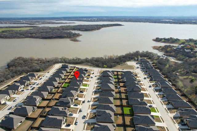 drone / aerial view featuring a water view