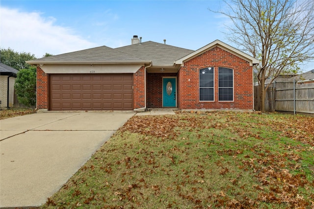 ranch-style house featuring a garage