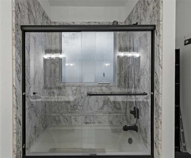 bathroom featuring enclosed tub / shower combo