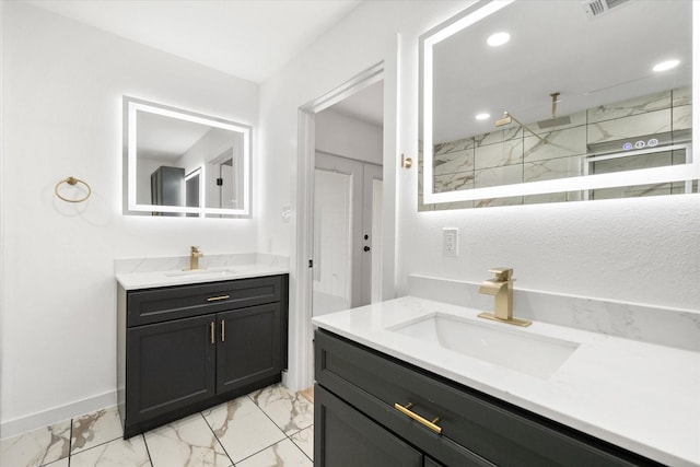 bathroom with a shower and vanity