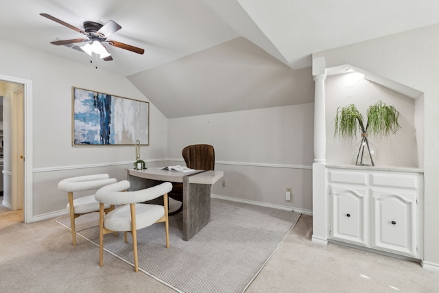 home office featuring ceiling fan, light colored carpet, and vaulted ceiling