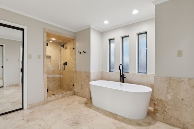 bathroom with tile walls, plus walk in shower, and ornamental molding