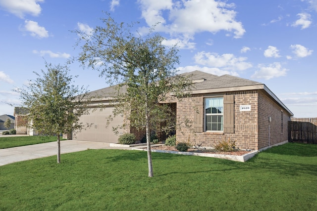 single story home featuring a front yard and a garage