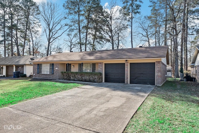 ranch-style home with a front lawn and a garage