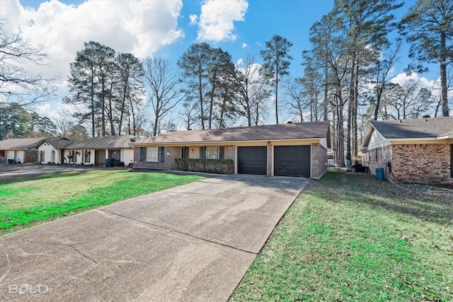 ranch-style house featuring a front yard and a garage