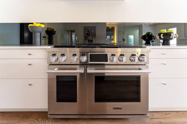 interior details featuring white cabinets