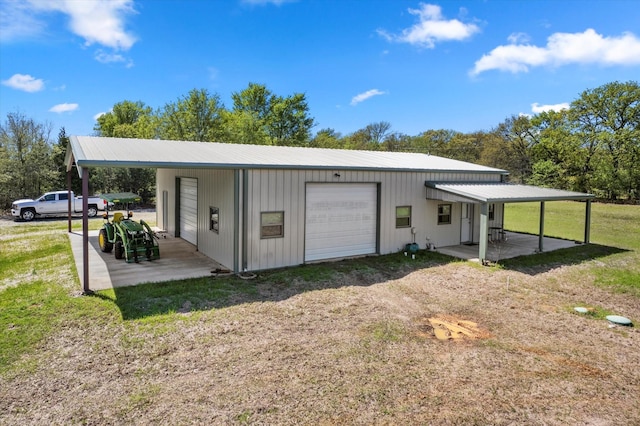 garage featuring a yard