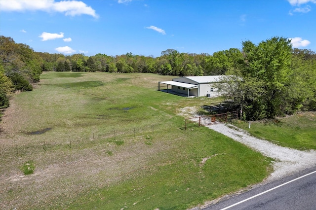 birds eye view of property featuring a rural view