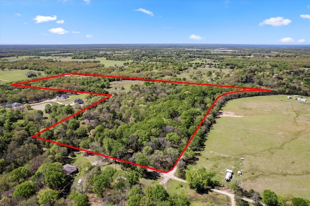 birds eye view of property featuring a rural view