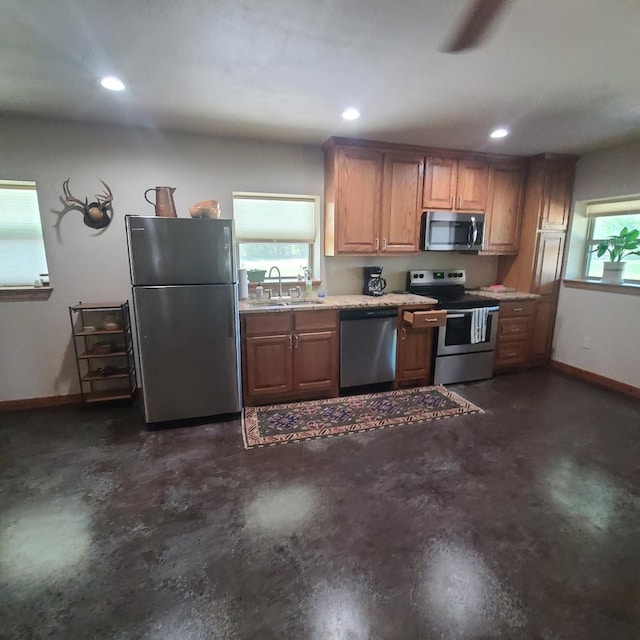 kitchen with sink and appliances with stainless steel finishes