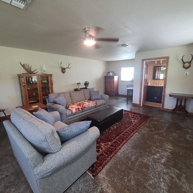 living room featuring ceiling fan